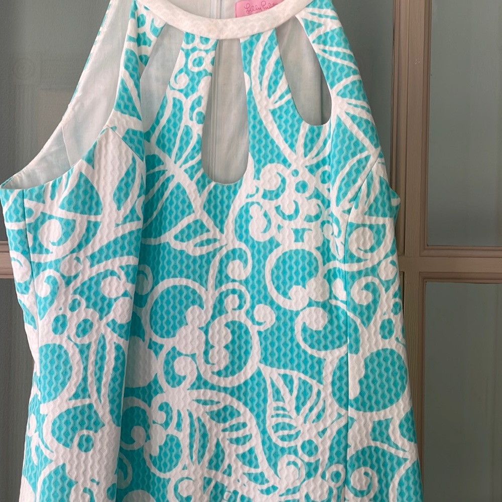 Lilly Pulitzer turquoise and white cute dress sz 6. Cut out detailing on top